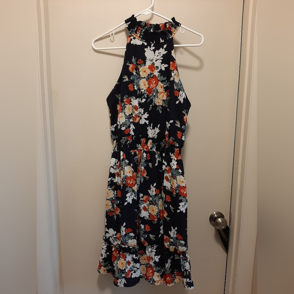 Navy halter dress, floral pattern.